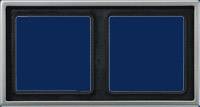 A door nameplate with two empty, navy blue name fields in a silver frame.