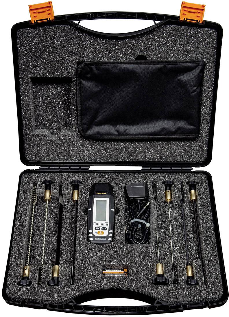 An open suitcase contains a digital measuring device, several metal probes, a power supply unit, and a cable, arranged in specific compartments.