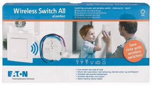 A packaging for an Eaton 'Wireless Switch All' shows a man and a child touching a light switch.