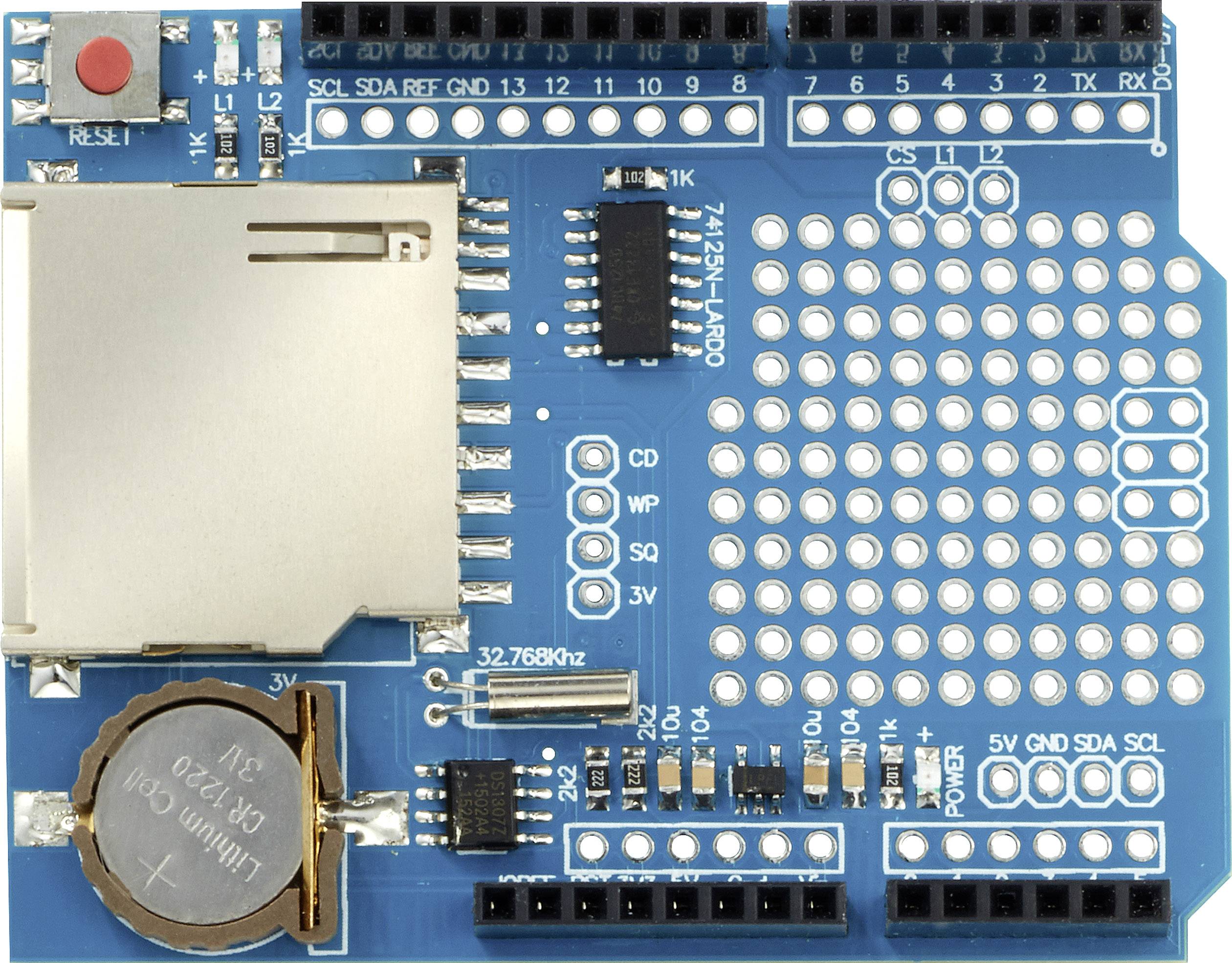 Electronic circuit board with SD card slot and battery holder. Numerous connections and soldering points for Arduino projects.