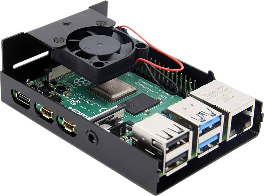A Raspberry Pi in a case with a fan. Visible are ports for USB, HDMI and Ethernet, along with a cooling system positioned above the board.