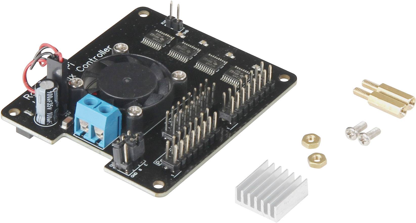 Circuit board with fan, connectors and heatsink, screws and standoffs in the top right. Electronic components clearly visible.