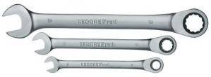 Three silver spanners in different sizes, arranged horizontally. Each spanner has an open-end and ring end.