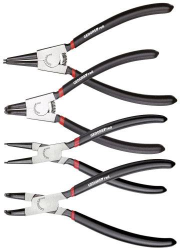 Five black pliers with red markings, arranged in a row. Each with different tip shapes for various tasks.