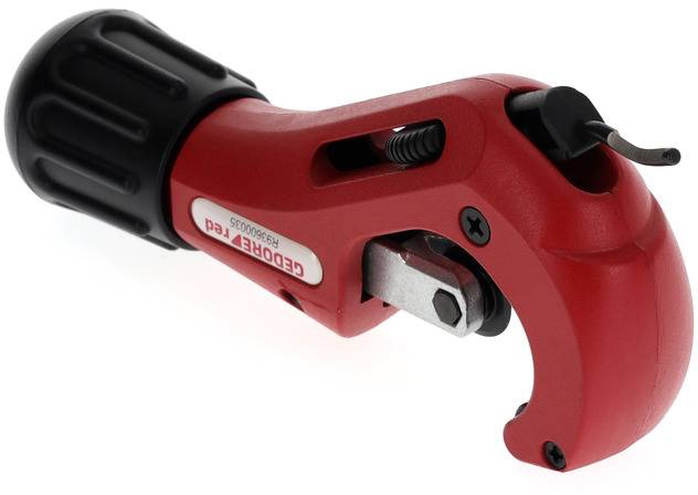 Red pipe cutting tool with black handle and adjustable blade. Used for cutting metal pipes.