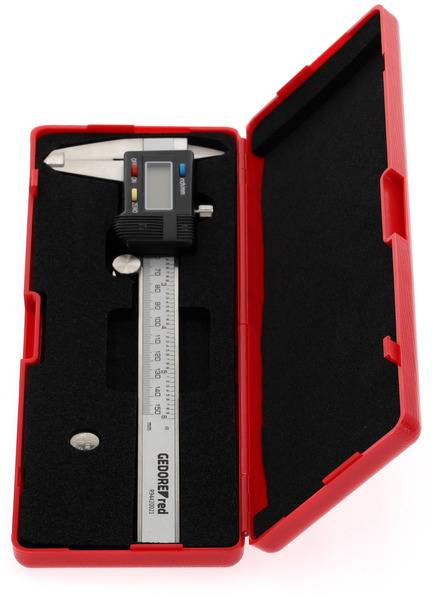 Electronic vernier calliper in a red plastic case, presented open. Metric scale and digital display are visible.