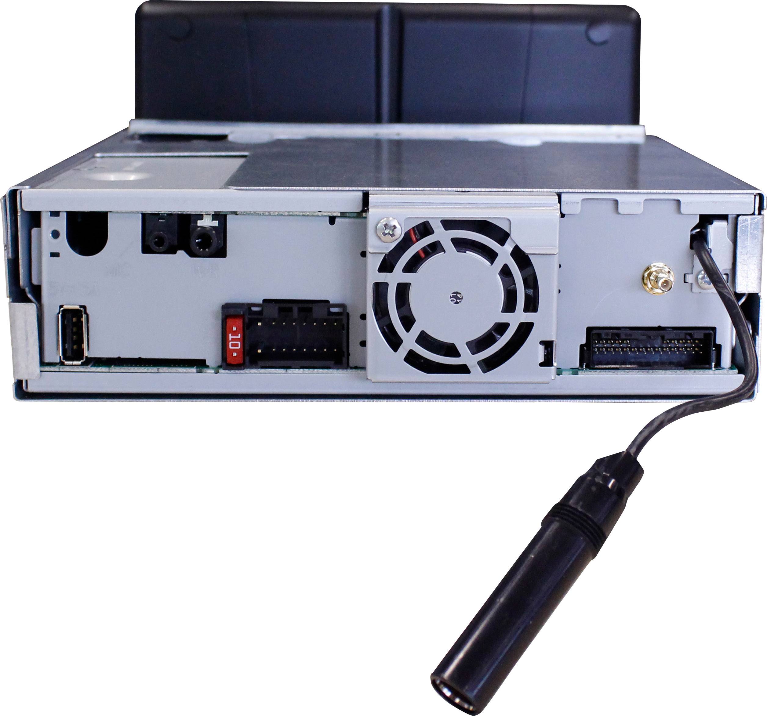 Rear view of a technical device showing a fan, various ports and cables. A black cable is plugged in.