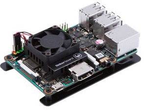Small, rectangular circuit board with multiple USB ports, HDMI port, and fan, often used for computer modelling or programming.