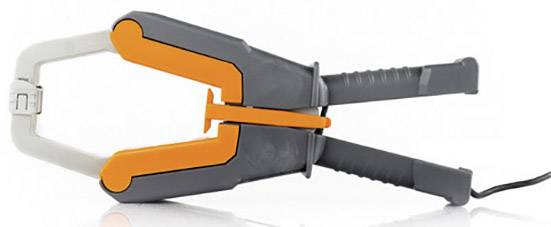 A grey and orange clamp with a plastic handle and cable, lies in an open position on a white background.