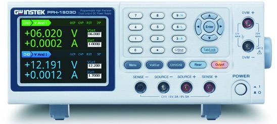 A digital multifunctional measuring device displays voltage and current values on a screen, with control buttons located to the right.