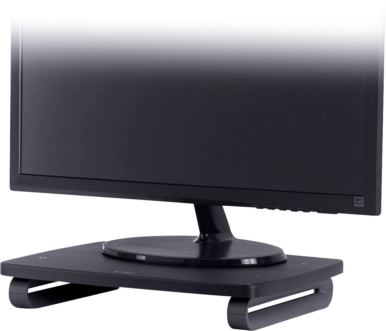 A black computer monitor stands on an adjustable monitor stand, positioned on a desk.