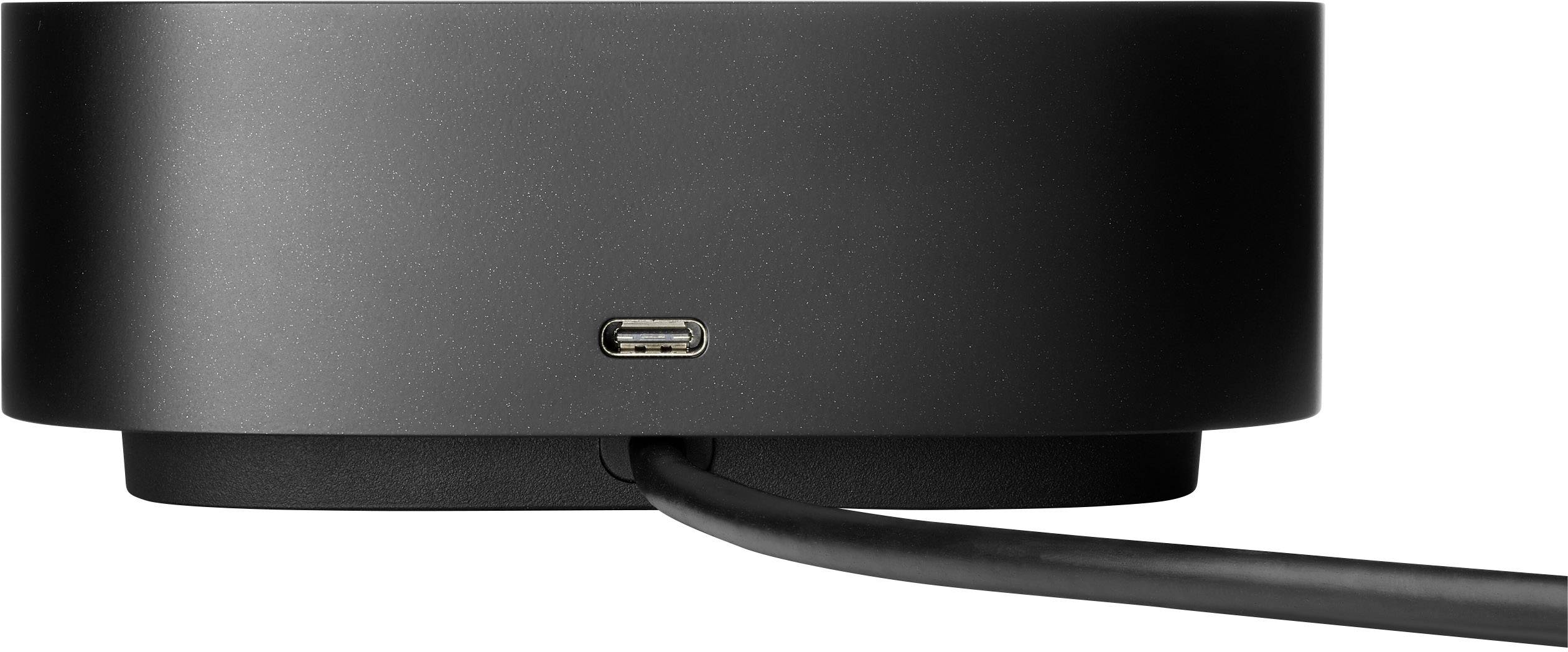 Black electronic device with USB-C port and cable plugged in, set against a white background.