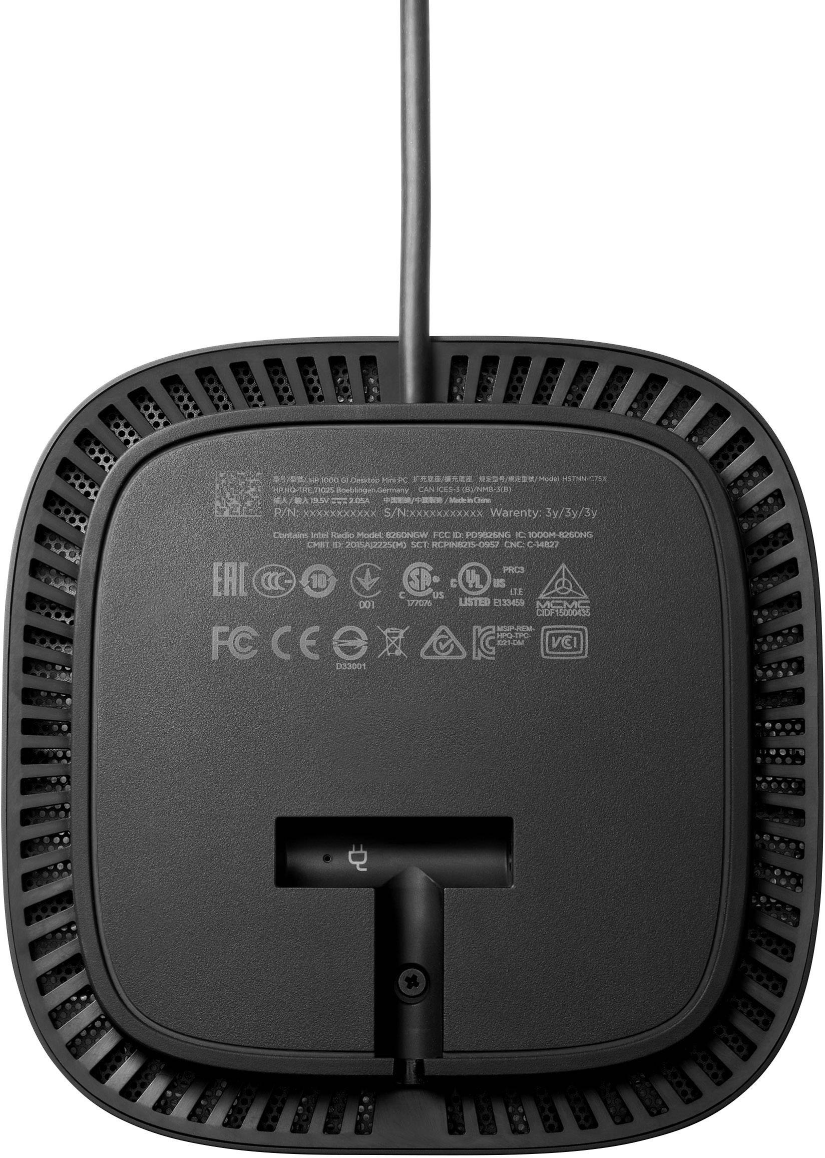 Underside of an electrical device with cable. Shows various certification and safety marks such as CE, FCC and others.
