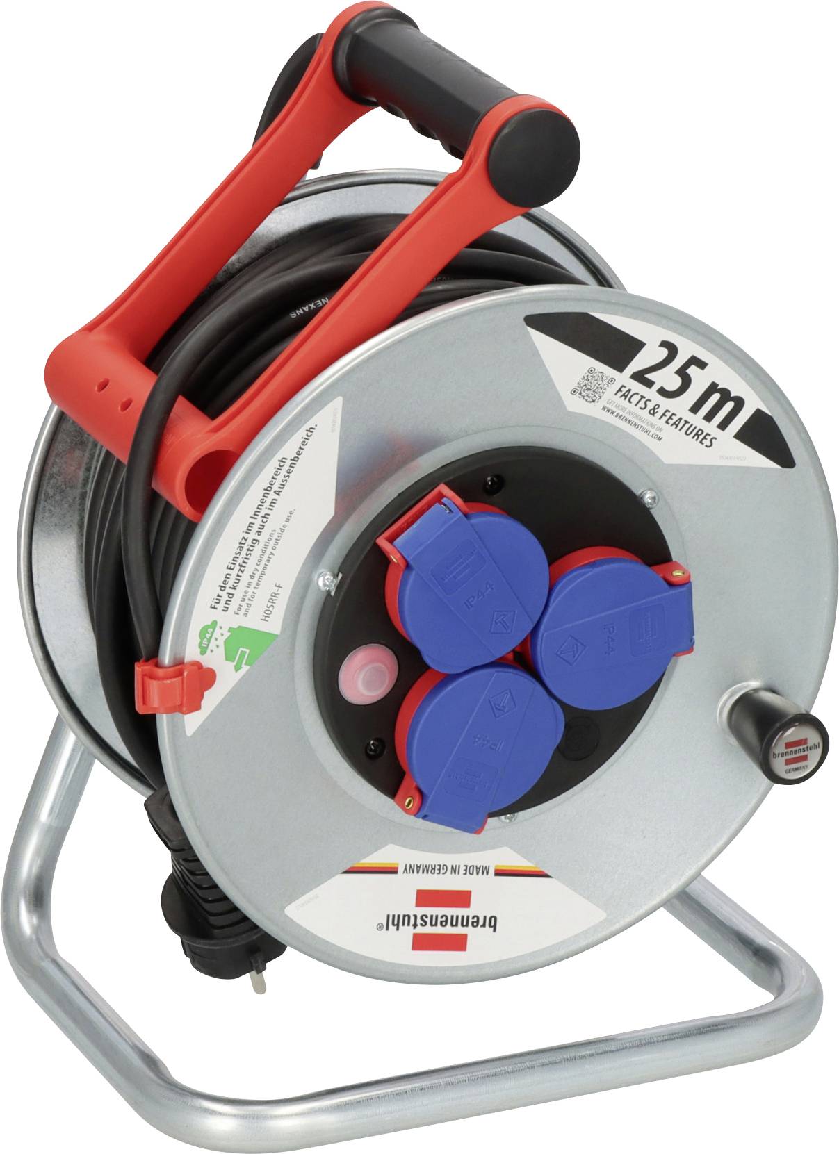 Portable cable reel on a metal stand with coiled black extension cord, red handle, and four blue power outlets, labeled 25m.