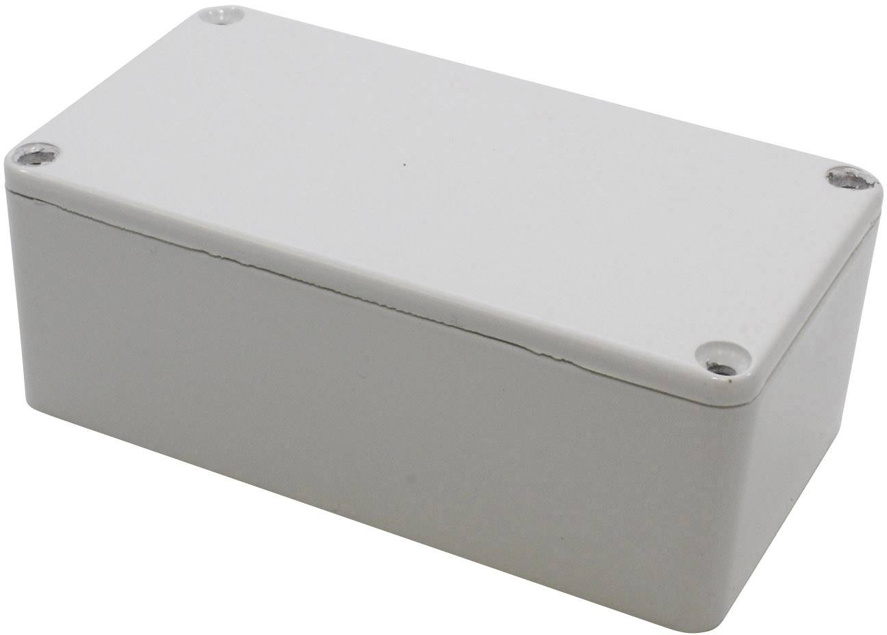 Rectangular grey plastic casing with rounded corners and four mounting screws at the corners.