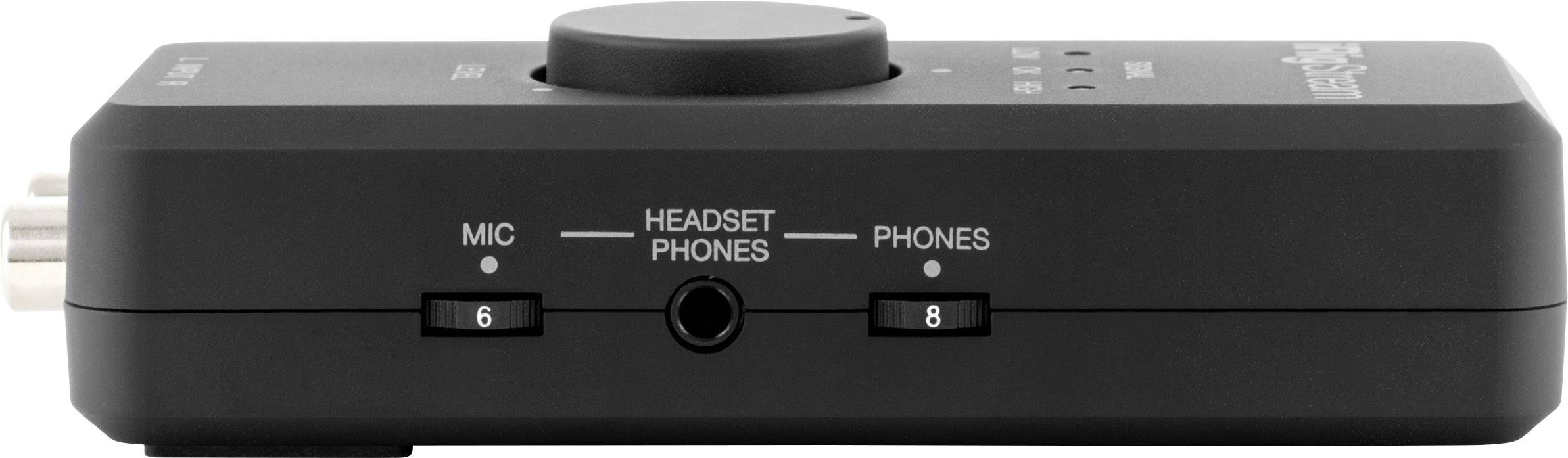 A black audio mixer with sockets for microphone and headphones. Volume level markings are visible.