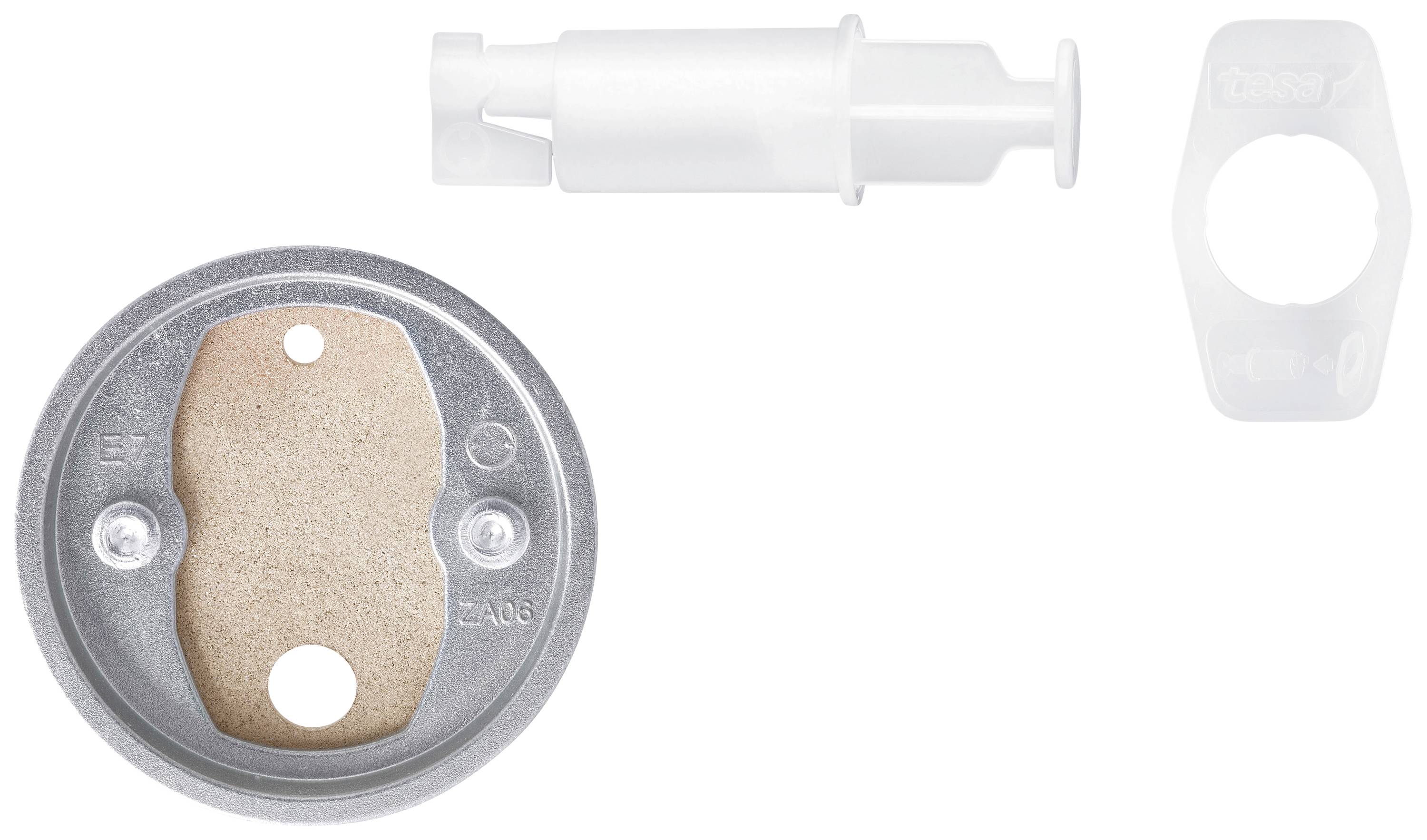 Round metal and plastic parts with holes and recesses. On the left, metal end with felt. On the right, white pen at the top, plastic ring at the bottom.