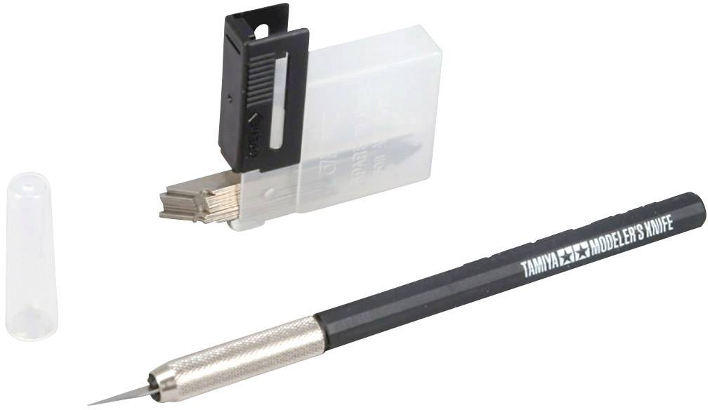 'Tamiya Modelling Knife', black handle, stainless steel blade, with protective cap and replacement blades in a clear box.