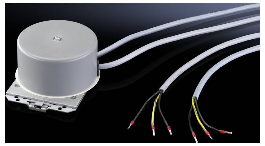 An electrical device in cylindrical form with cables showing different colours for the connections. Mounted on a metal plate.