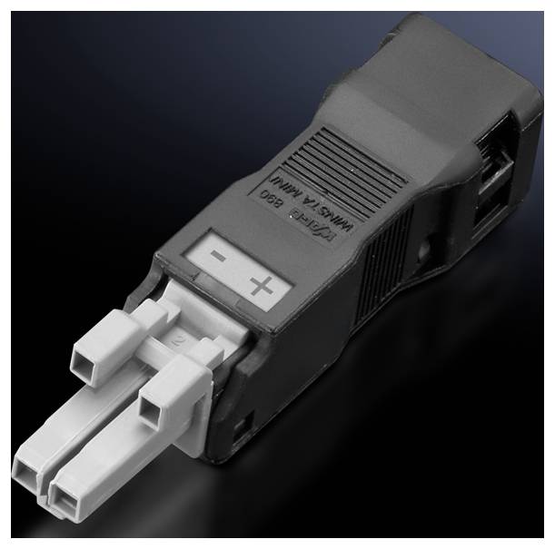 A black and grey coupling plug adapter, marked with '+ -', positioned against a dark background, showing the connection side.