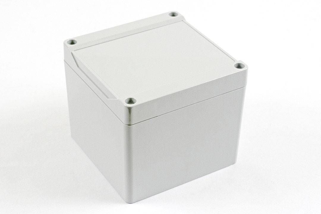 Grey, square electrical cable enclosure with a removable lid, suitable for protecting electronic components.