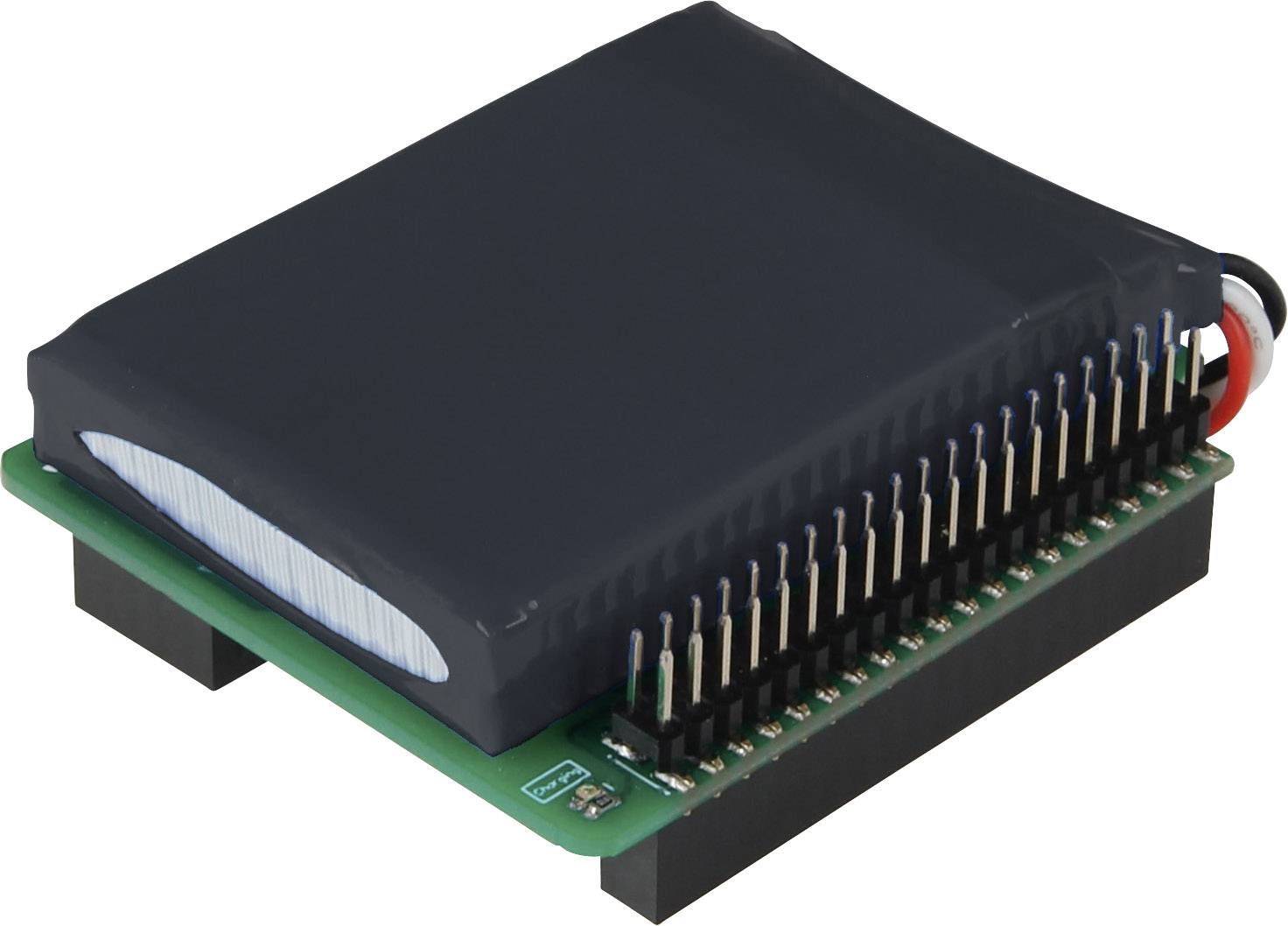 Black electronic module with numerous pins on a green circuit board, side view, showing technical component.