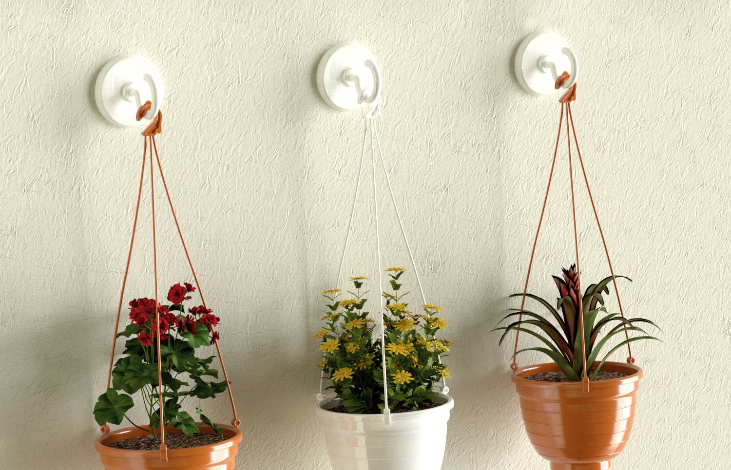 Three hanging plant pots on a wall. On the left, red flowers; in the middle, yellow flowers; on the right, a plant with long leaves.