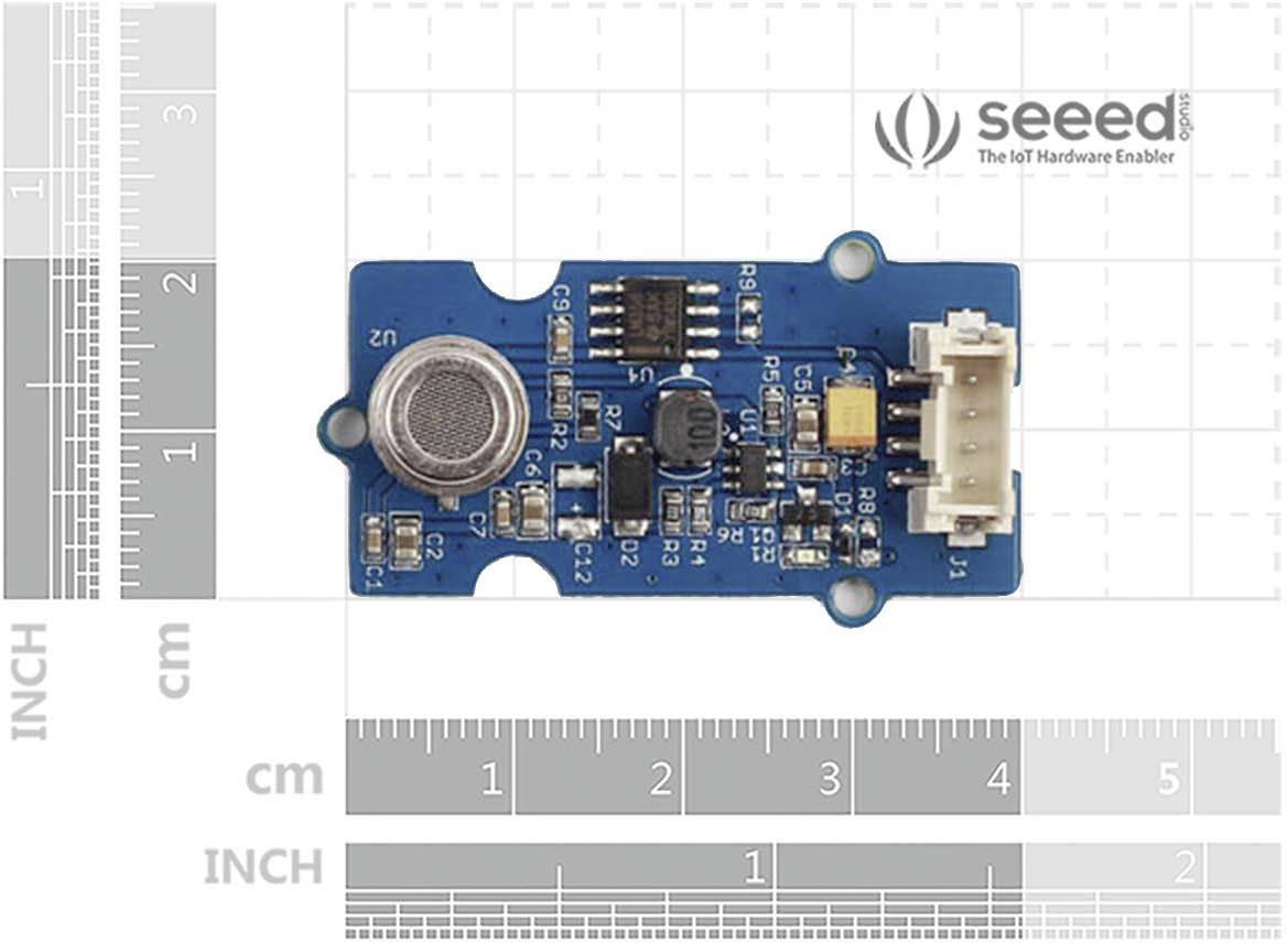 Close-up of a sensor on a measurement scale with electronic components. The Seeed logo, 'The IoT Hardware Enabler', is positioned in the top right.