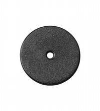 A round, flat, black board with a central hole, against a neutral background.