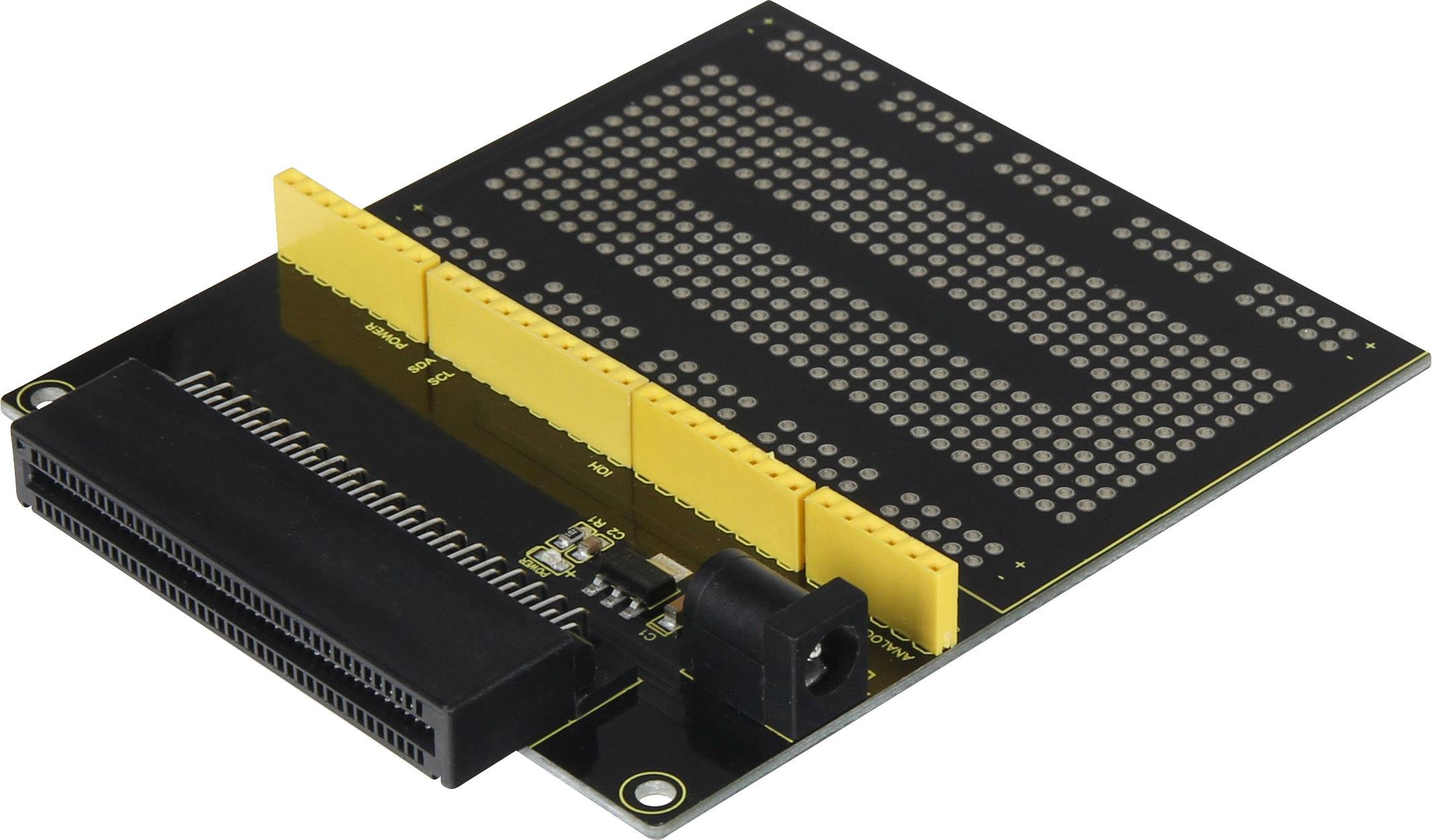 A black electronic circuit board with yellow connection points and connectors.