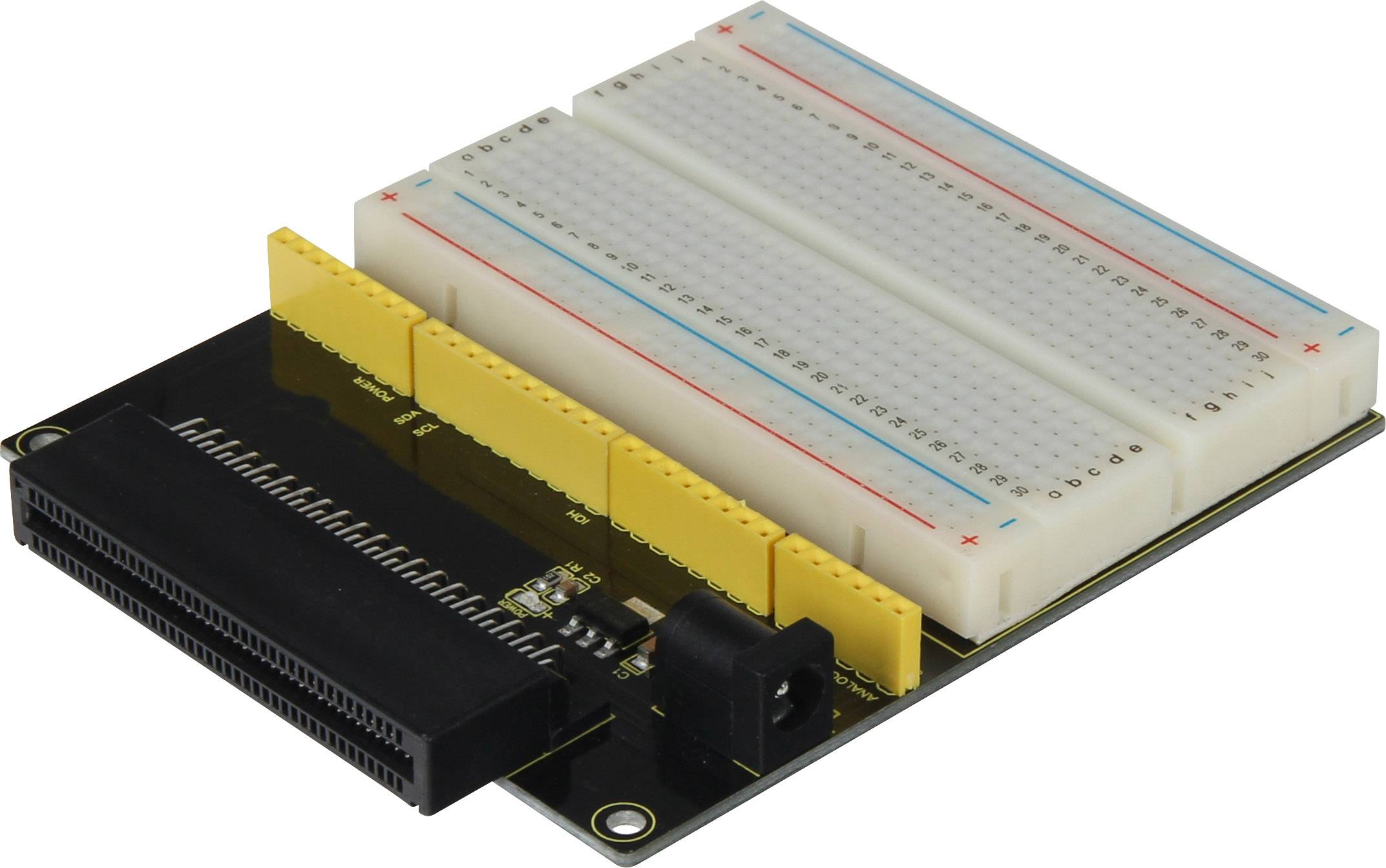 A breadboard with yellow connector strips for electronic components and black plug-in slots for additional connections.
