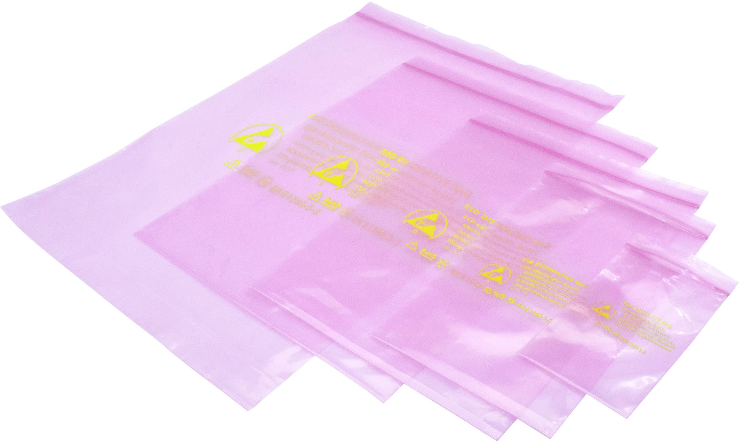 Several pink anti-static bags in various sizes, stacked. Yellow print with warning labels.