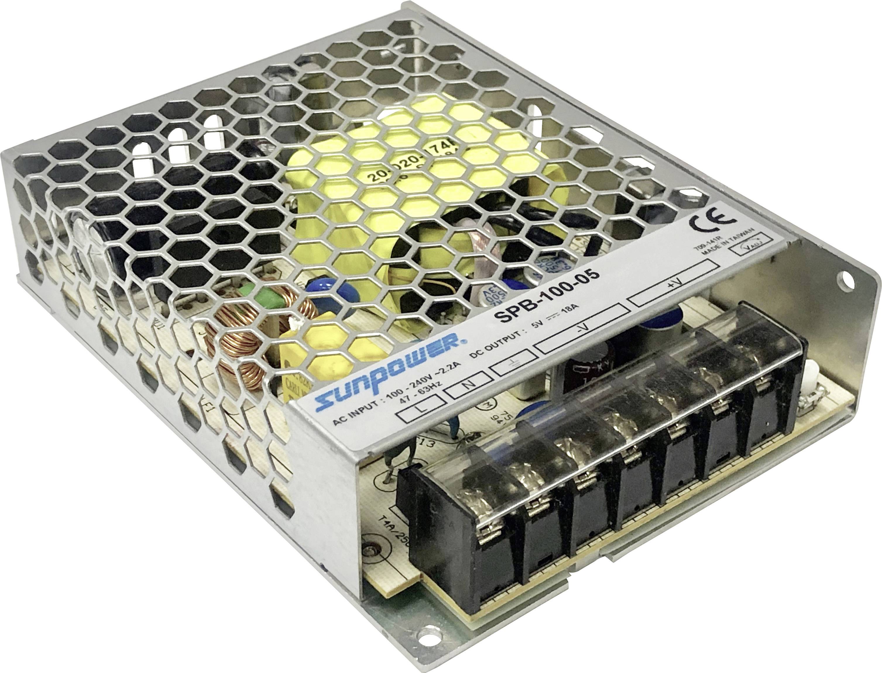 Metallic switch-mode power supply with ventilation grilles, labelled 'Sunpower SPB-100-05', showing connection terminals and internal electronic components.