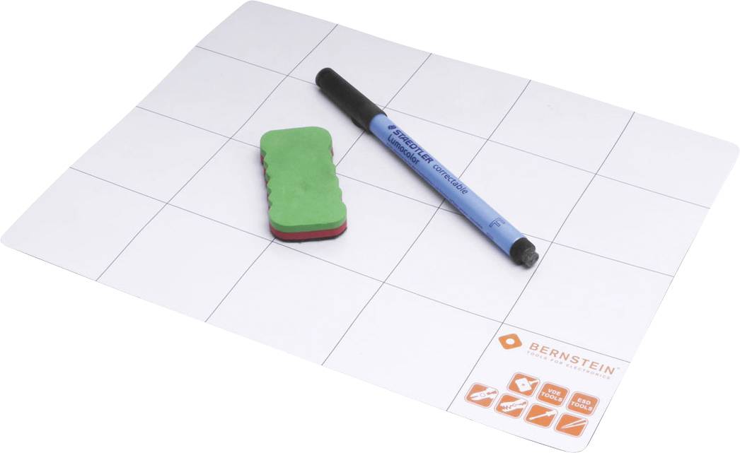 White magnetic gridded board, blue pen and green cleaner placed on top.