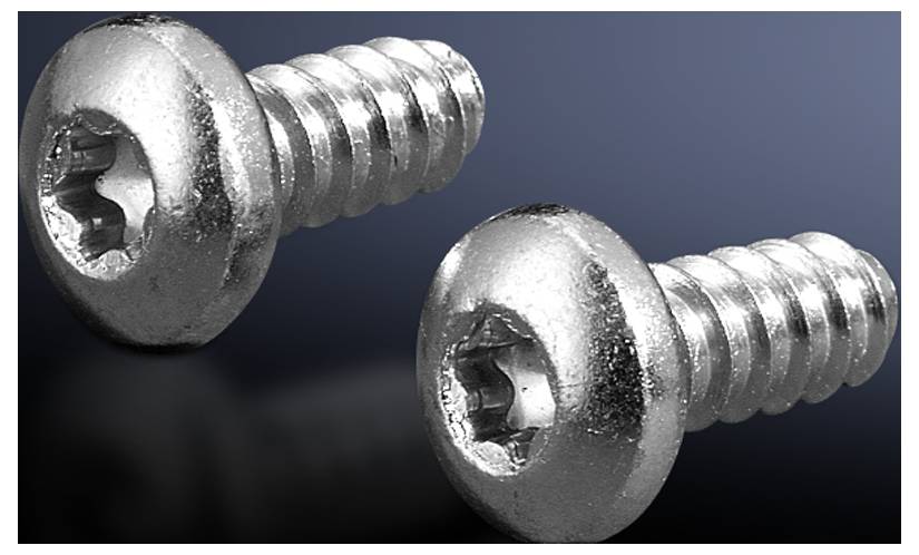 Two silver cross-head screws lying diagonally against a dark background.