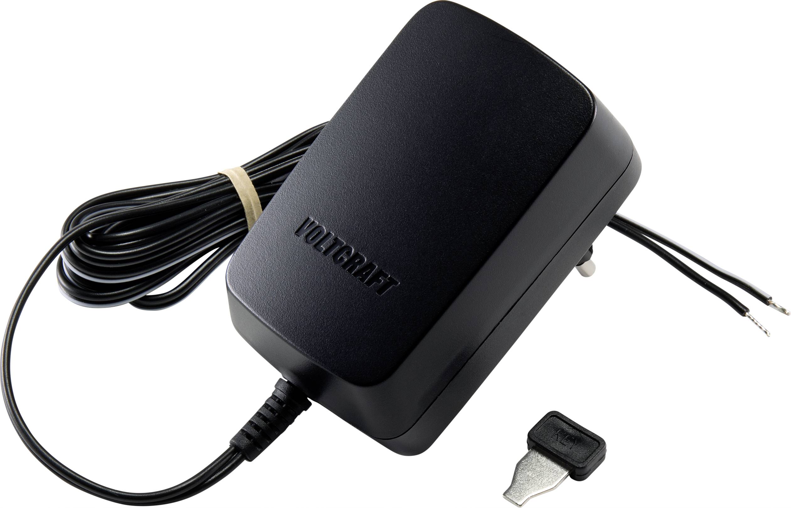 Black power supply with cable and two-pin plug, alongside a small silver key.