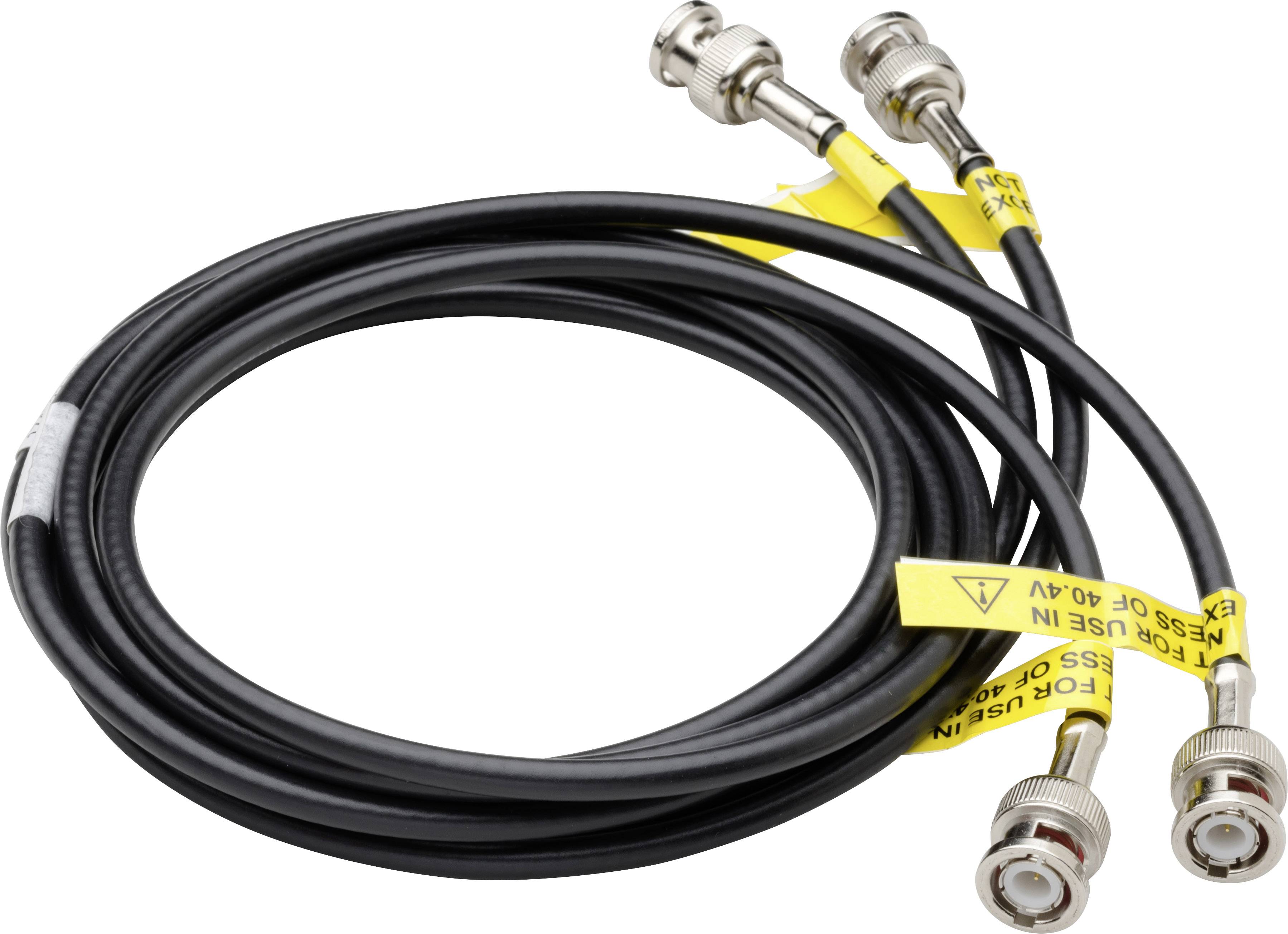 A black coaxial cable with BNC connectors at both ends. Yellow warning labels are located near the connectors.