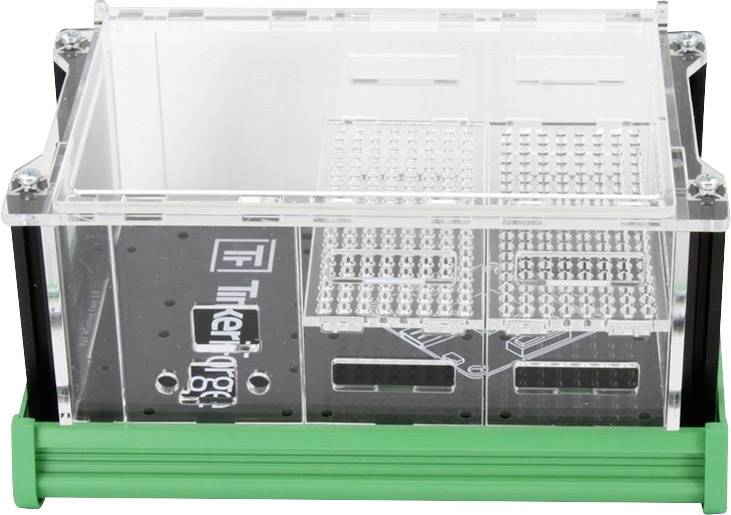 A transparent plastic container with a green base shows structured interior surfaces and logos.
