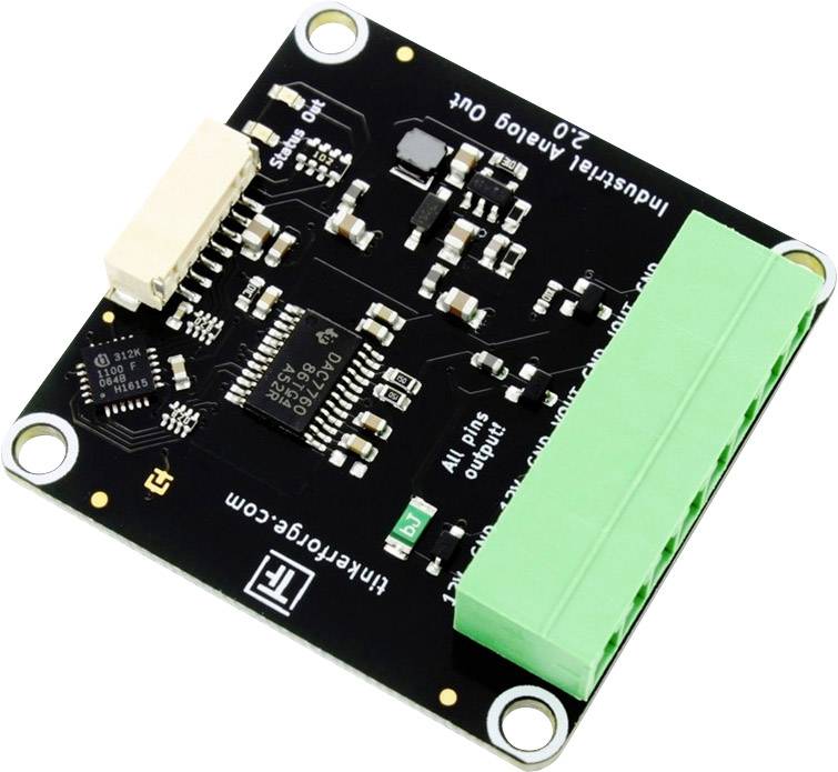Small electronic circuit board with several black and silver components and a green multi-port connector on the side.