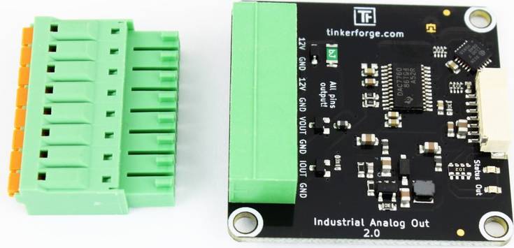 Analogue Output Module from Tinkerforge, Version 2.0, with green connection terminals. Main circuit board shows circuit components.