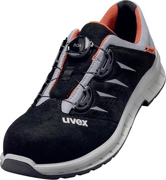 A black safety shoe with a white sole, orange accents and 'uvex' logo. Dial closure system is visible.