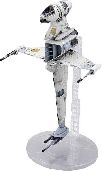 A model of a futuristic space fighter with a sleek structure and two lateral wings, presented on a transparent stand.