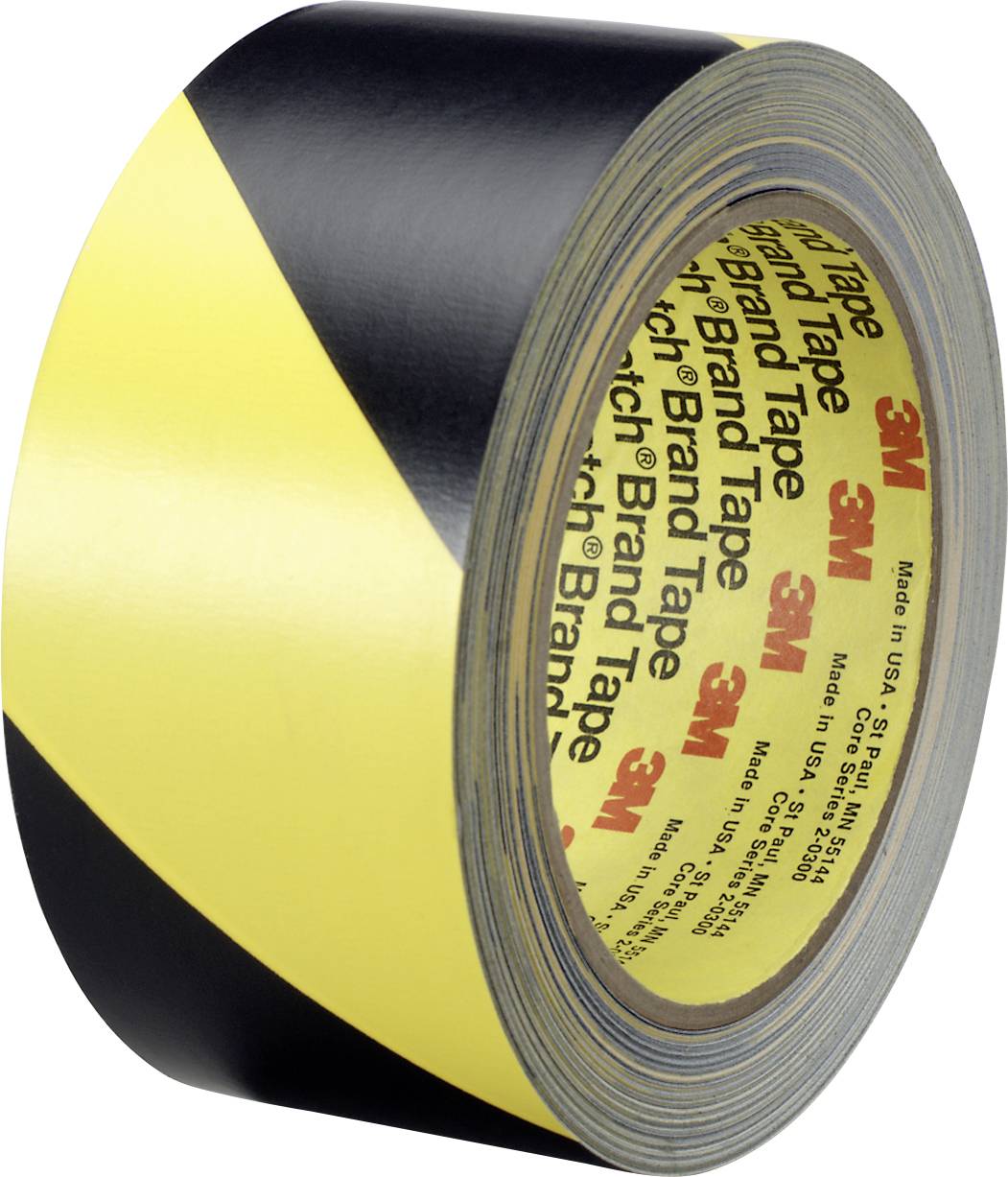 Yellow and black warning adhesive tape, diagonally striped, from the 3M brand, on a roll.