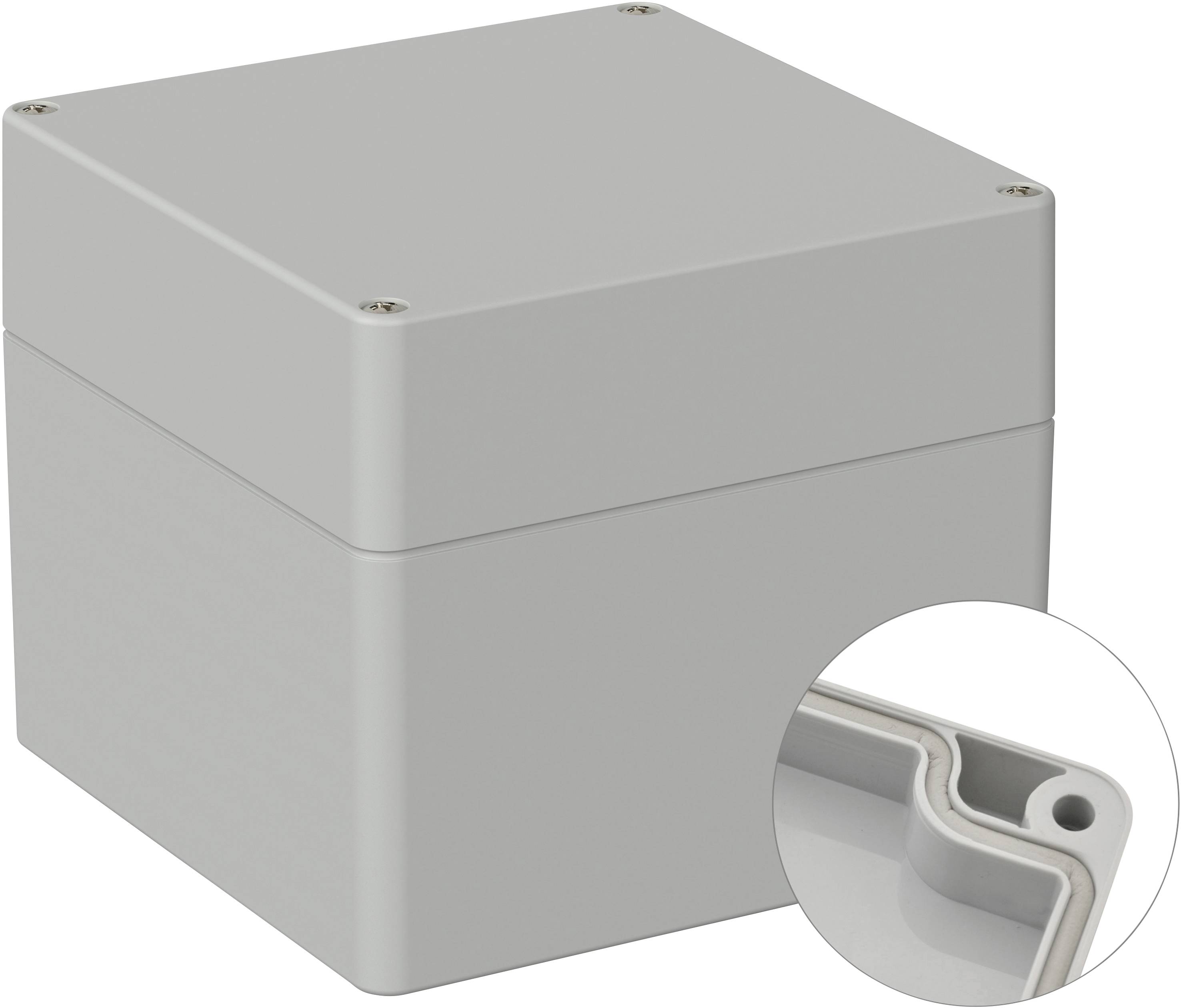 Rectangular grey enclosure with a removable cover, screws visible near the corner; detailed view of an inner edge.