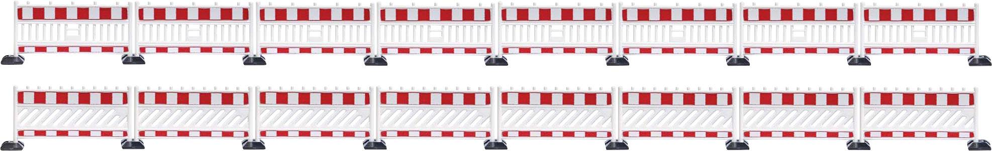 Several red and white barrier fences arranged in two rows signal a construction site or a cordoned-off area.