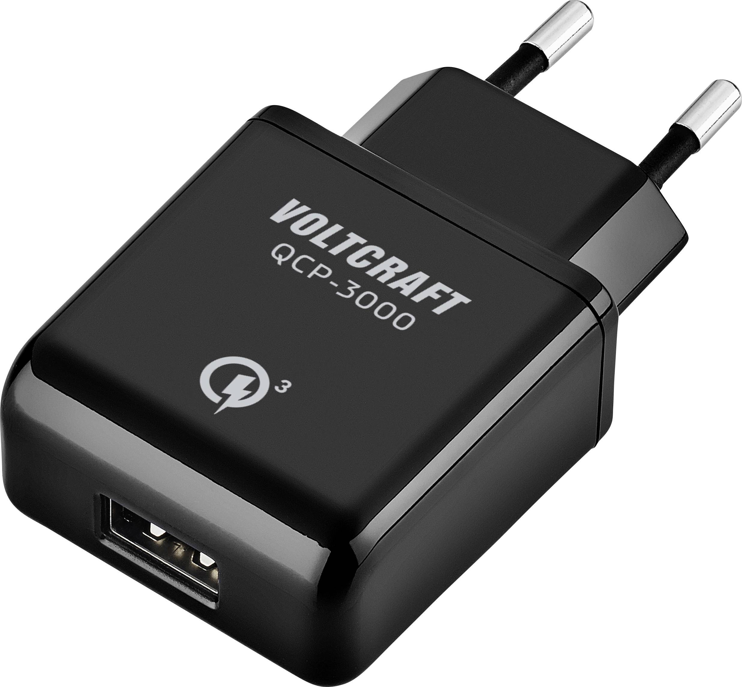 Black USB wall charger with two round pins, labeled 'Voltcraft QCP-3000'. Features a lightning bolt symbol, indicating Quick Charge capability.