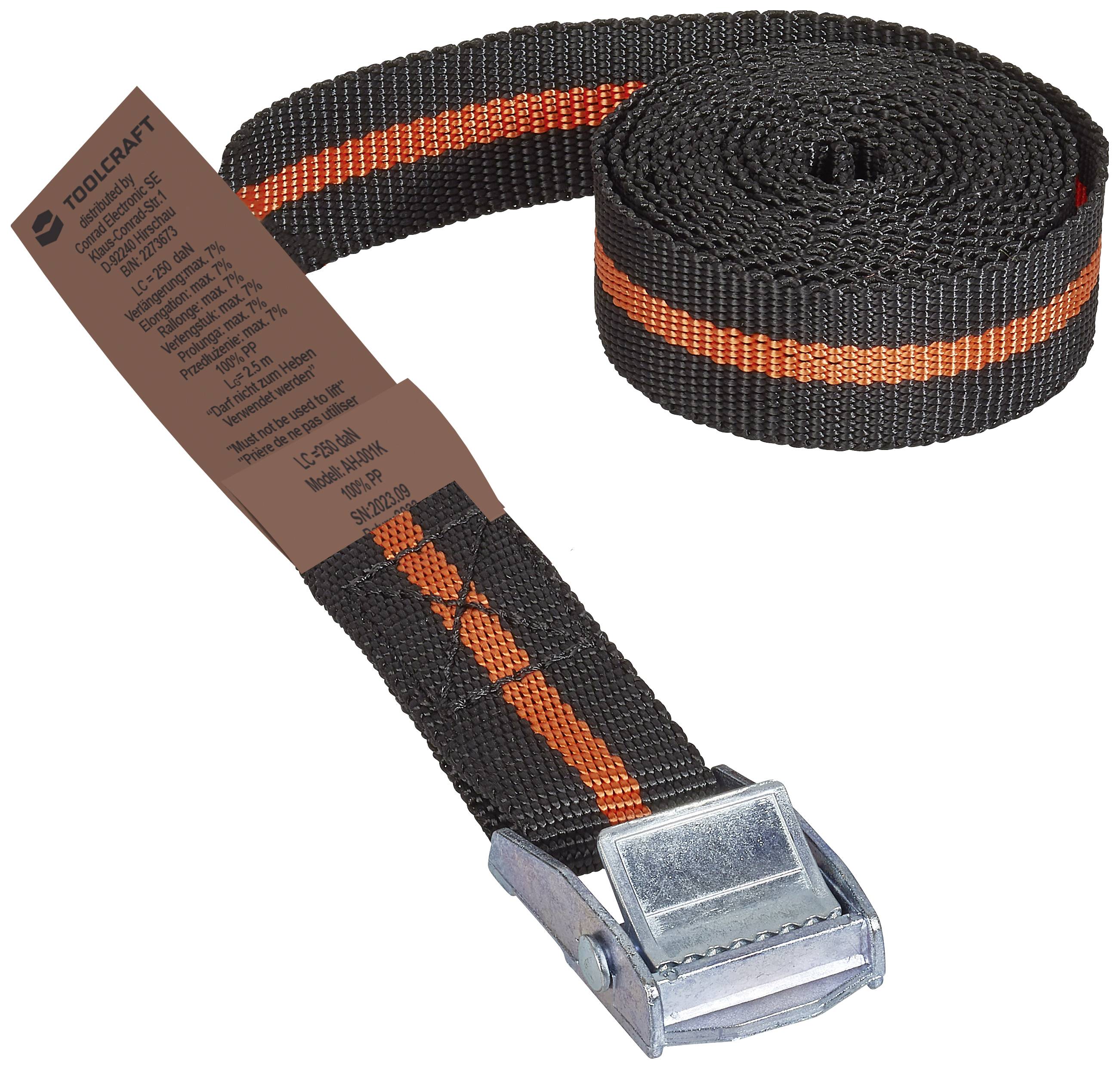 A black ratchet strap with an orange stripe, rolled up, with a metal ratchet mechanism and a labelled tag for secure fastening.