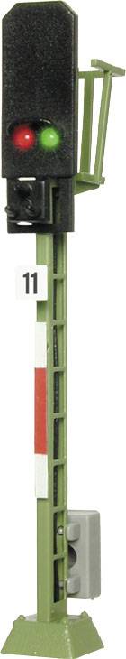 A green and red railway signal on a green mast with the number 11 on the front, indicates clearance and stop conditions.