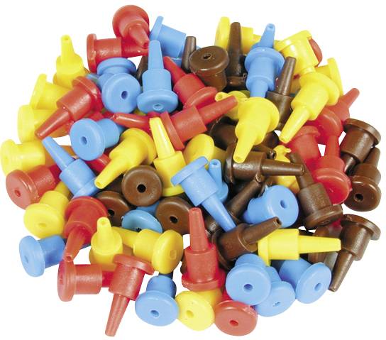 Colourful plastic pins in red, yellow, blue and brown are lying in a heap. They have sharp ends and round heads.