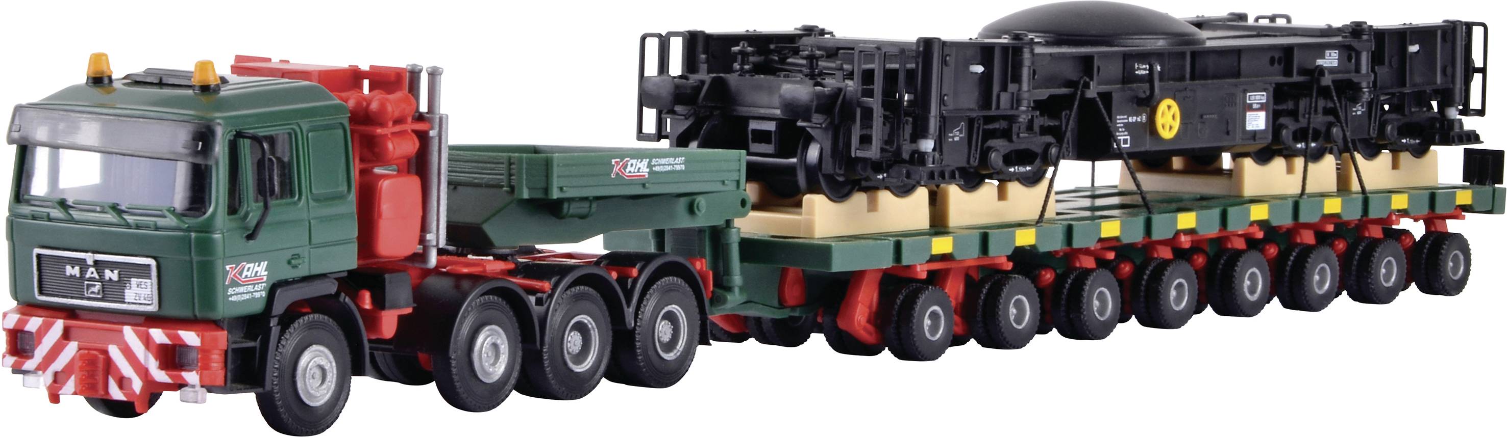 Kibri 13601 H0 HGV MAN SK with Scheuerle platform wagon with rail crane lower section